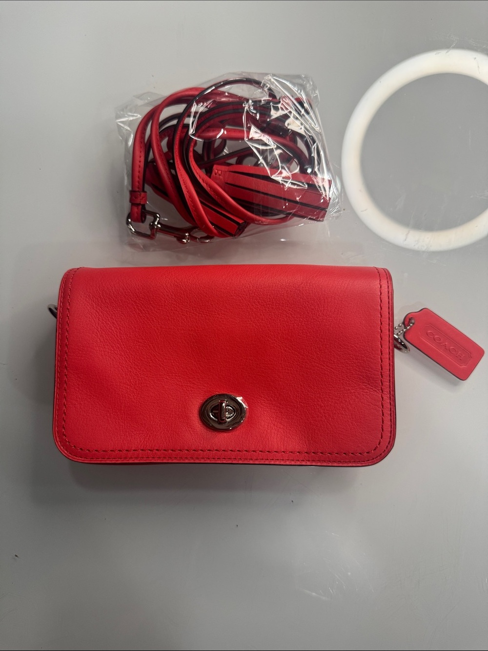 COACH 19914 Legacy Penny Carnelian Orange Red-Pink Turnlock Crossbody Bag
